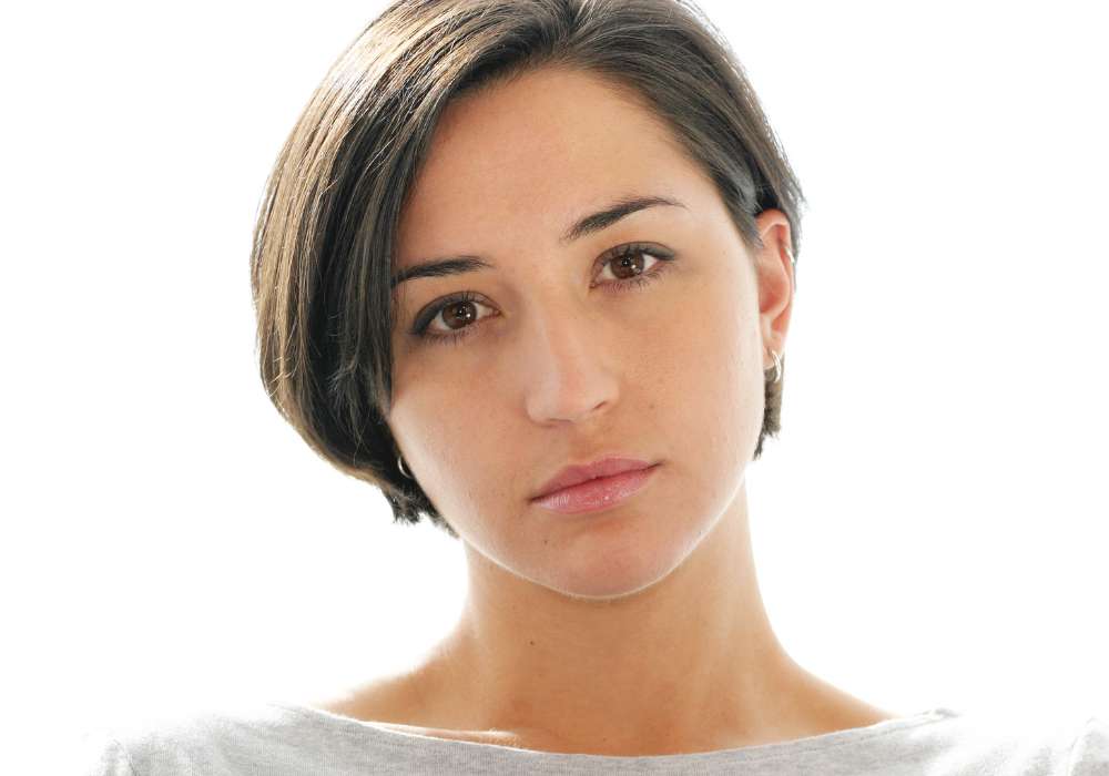 close-up photo of emotionless woman Dry Personality