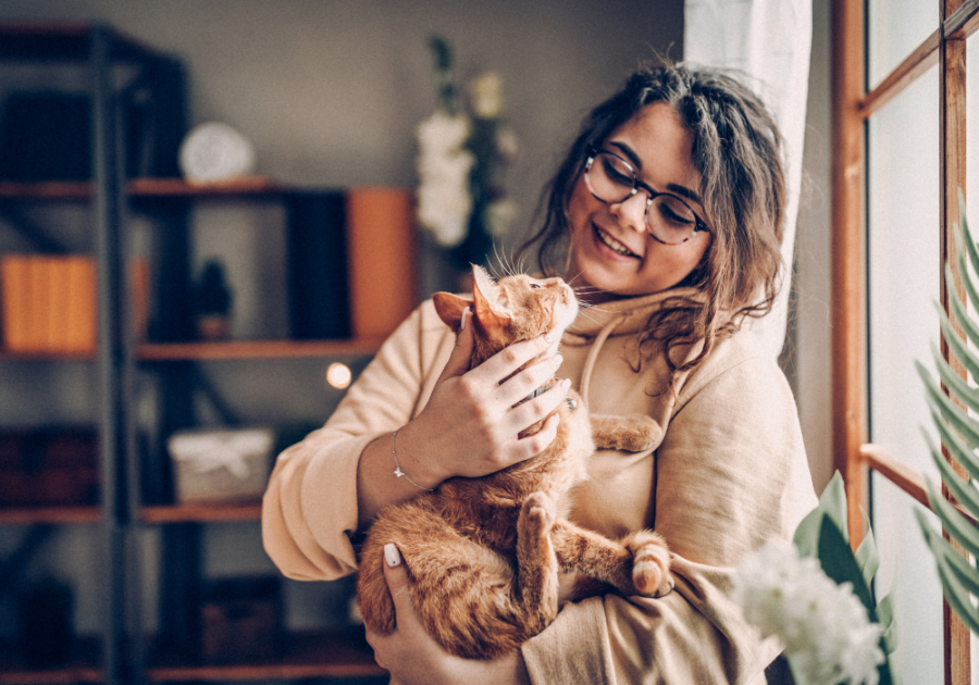 a cat-mom being lovey with her cat sigma female personality