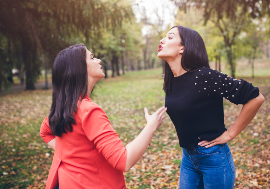 two angry women shouting at each other friend betrayal