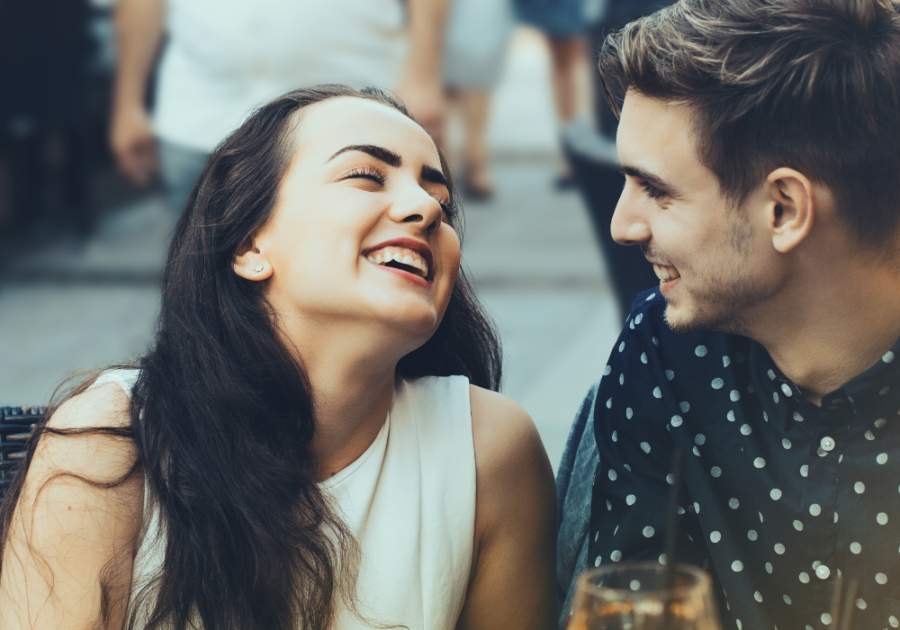 young man and woman sweetly talking how long should the talking stage last