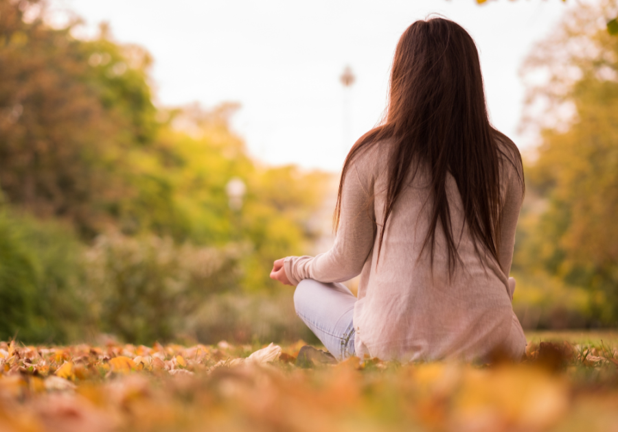 one woman sitting on the ground emotional goals