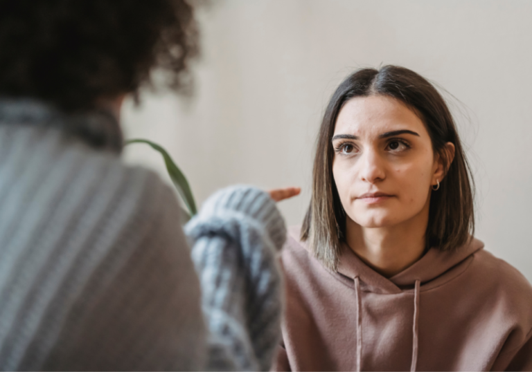 women talking intense Red Flags In Friendships