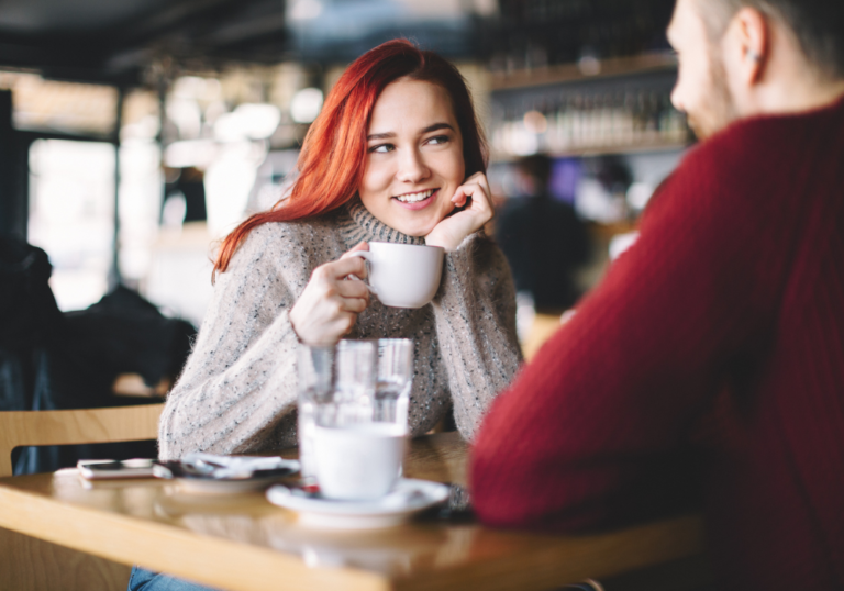 sweet couple having a date in a coffee shop how long should the talking stage last