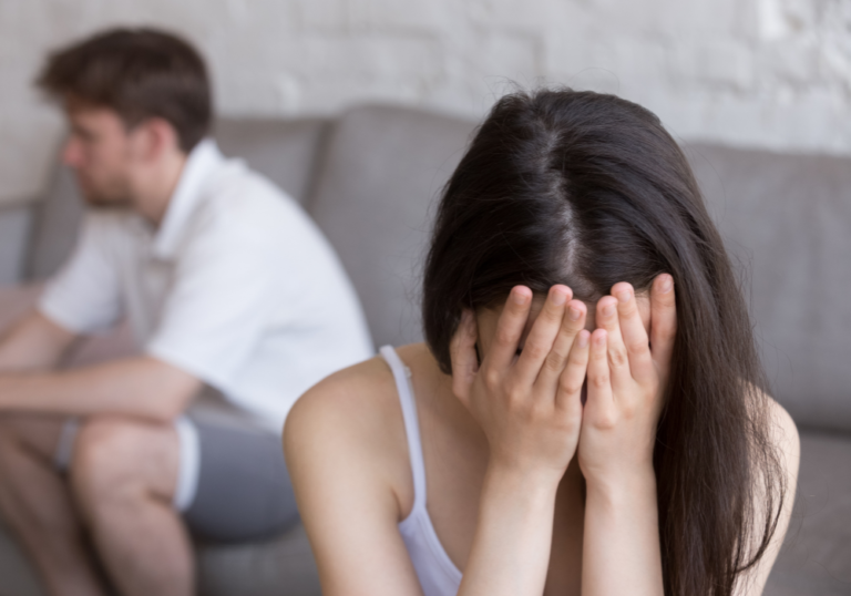 woman covering her face signs of an insecure woman