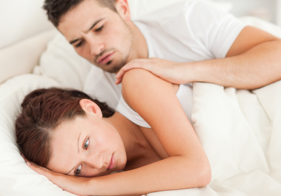 young man trying to talk to his girlfriend while in bed toxic girlfriend signs