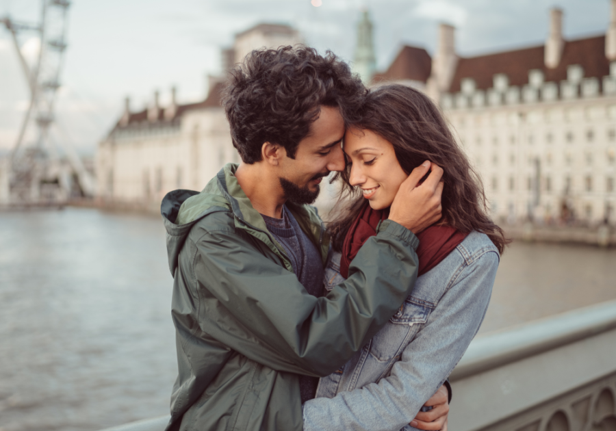 sweet couple showing affection outside Stages of dating