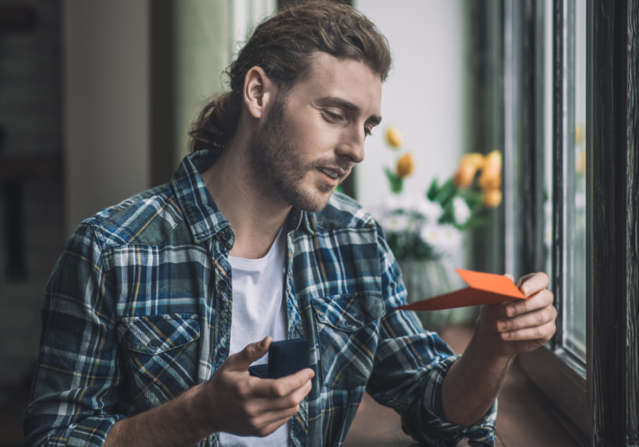 husband happily reading a letter from wife love letters for my husband