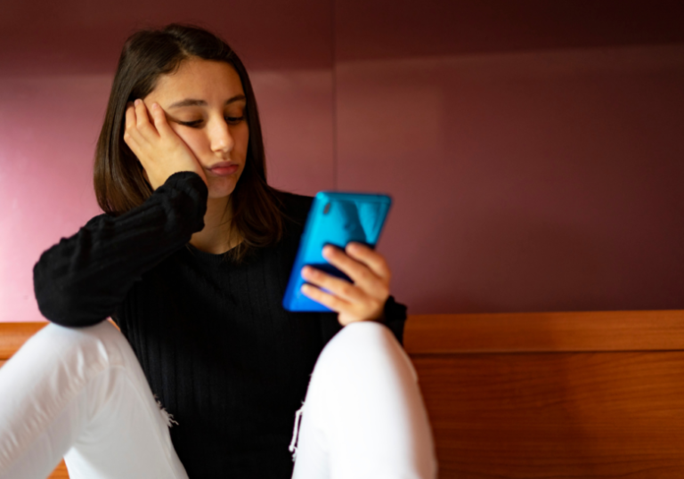 woman looking at phone no response is a response