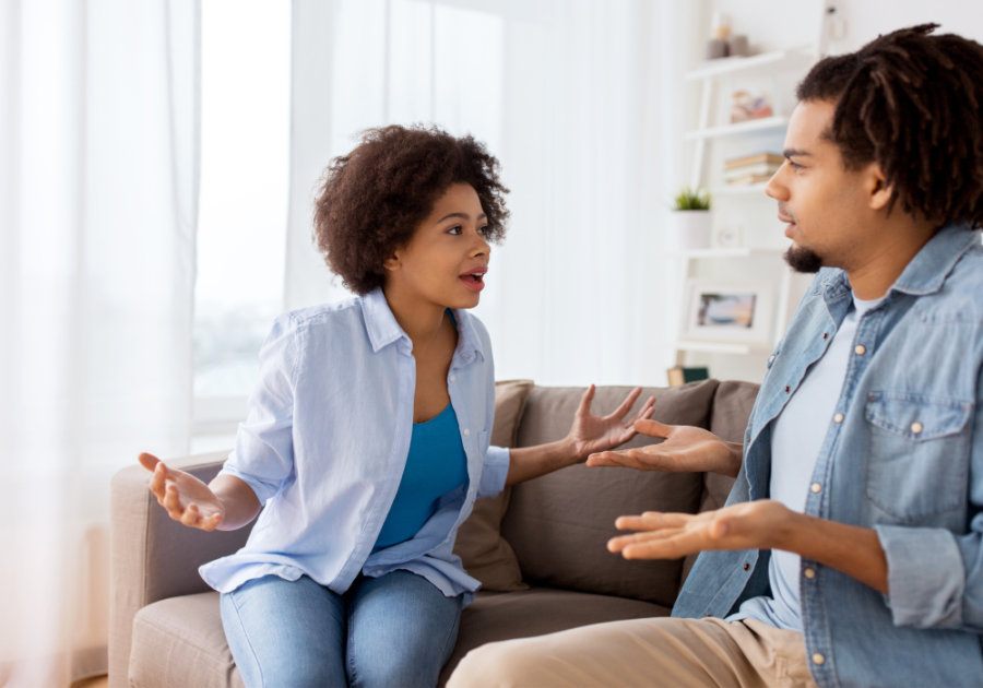 couple sitting in couch talking signs of disrespect in a man