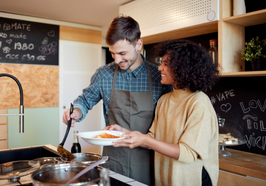 young couple cooking together effort in a relationship