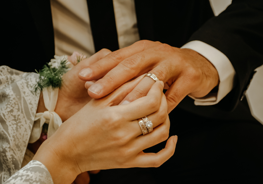 husband and wife wearing wedding rings romantic wedding vows to make him cry