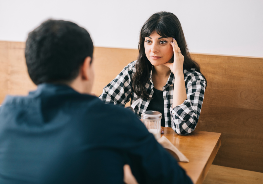 couple having a talk in a cafe why do relationships end in 3 months