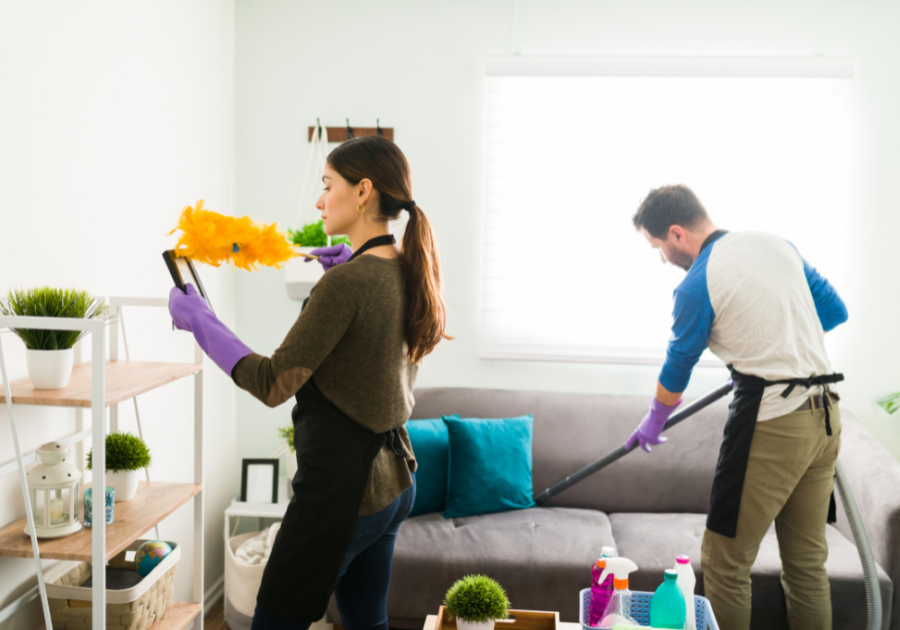 young couple cleaning the house together fun things for couples to do at home