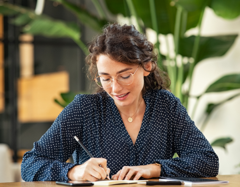 woman writing letter thank you letters for him