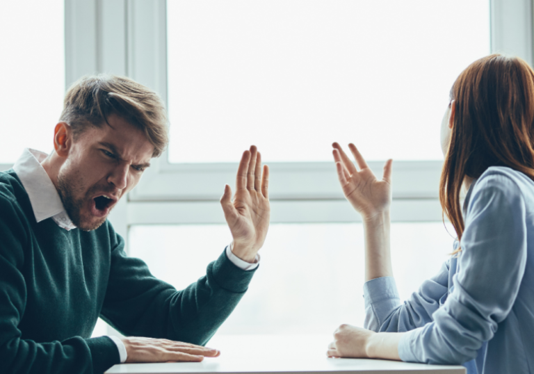 man and woman intense conversation how to stop yelling in a relationship