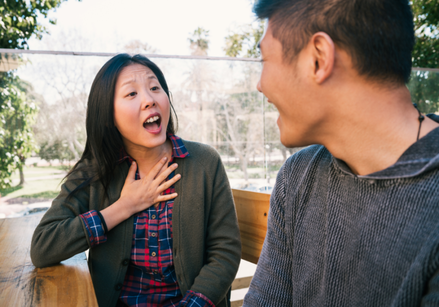 woman talking to a man in a bench relationship check-in questions