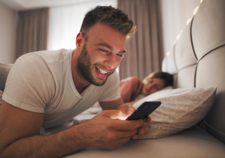 man in phone while girlfriend is sleeping narcissist cheating signs