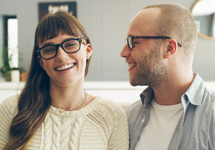 husband looking at his wife while they are smiling how to respond to a compliment