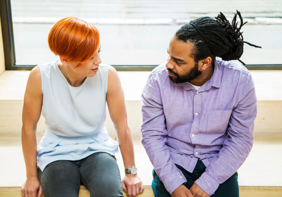 couple talking while sitting down relationship check-in questions