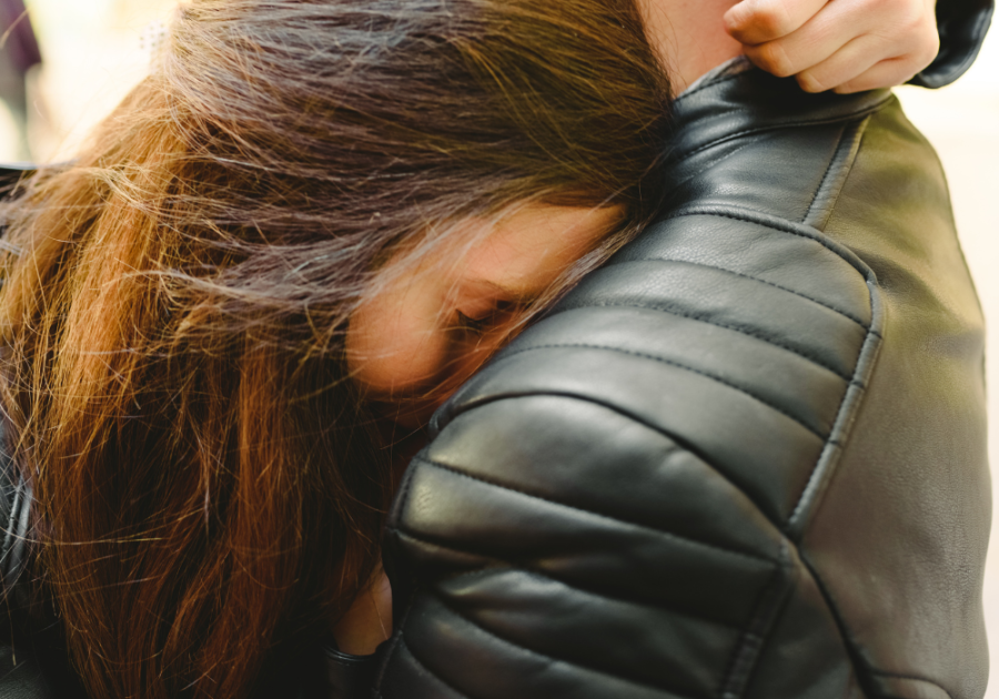 woman hugging someone stages of a narcissist relationship