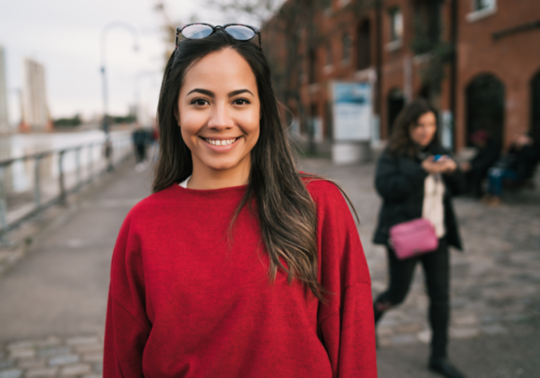 woman posing outdoors Beta Female Traits