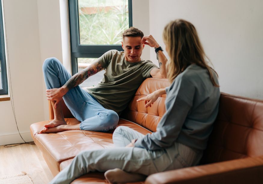 couple talking on sofa Narcissistic Projection