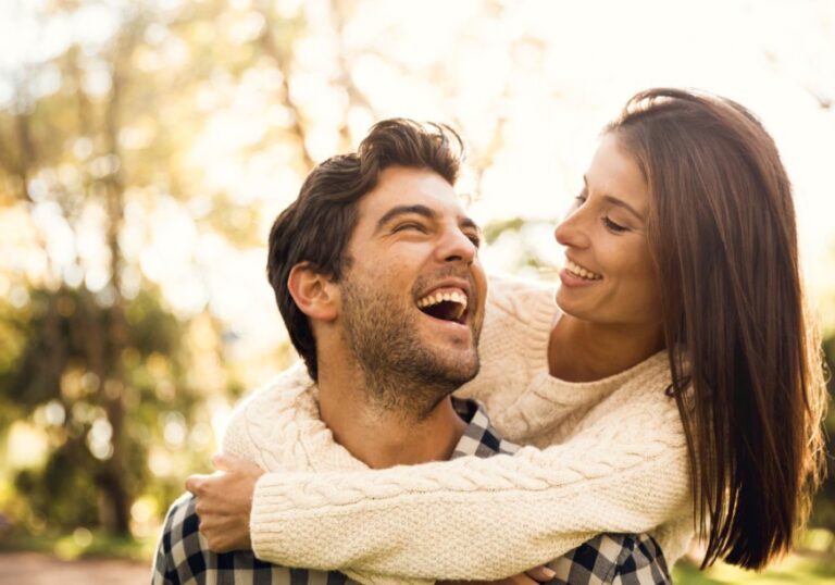 woman hugging man Words to Describe a Handsome Man