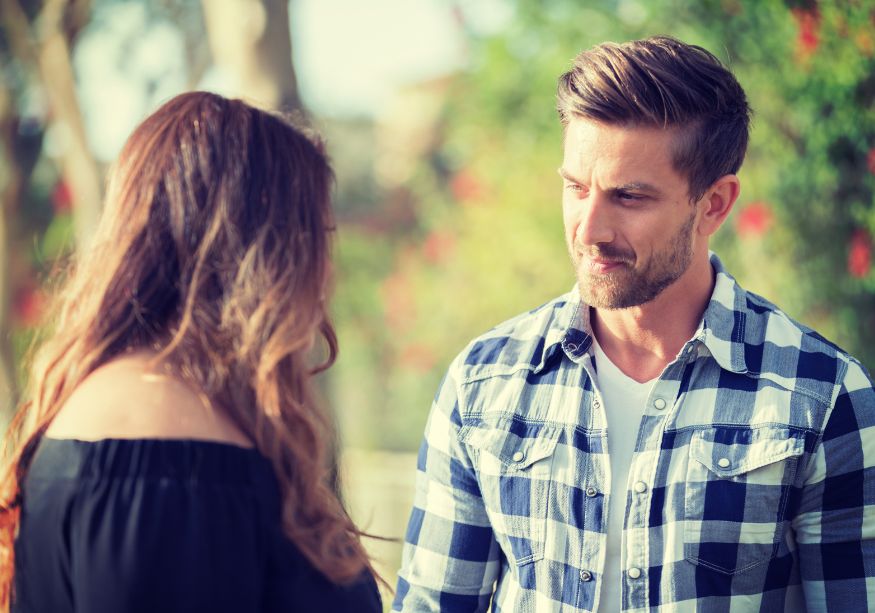 man and woman talking outside how to know it's time to break up