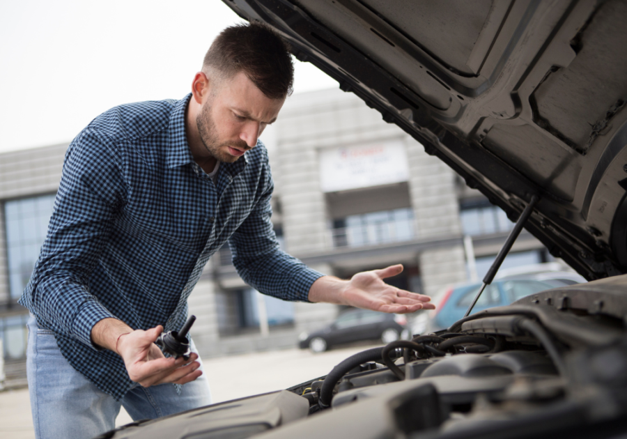 man working on car Good Excuses To Miss Work On Short Notice