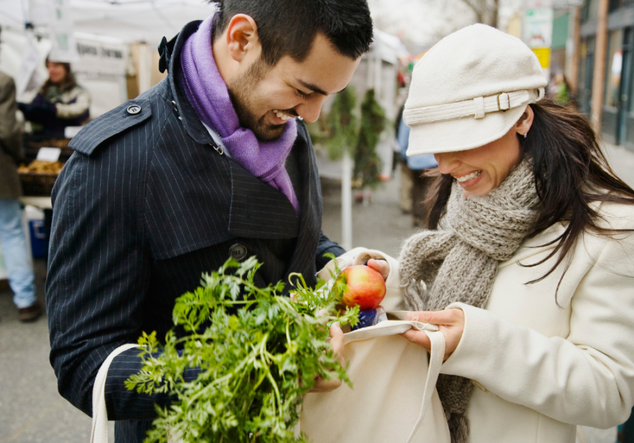 couple at outdoor market together Last-Minute Date Ideas