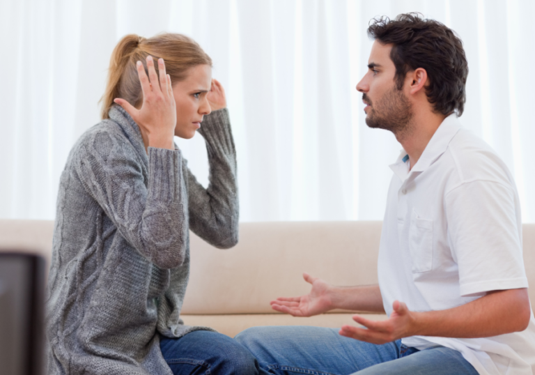 couple arguing sitting together stages of a dying marriage