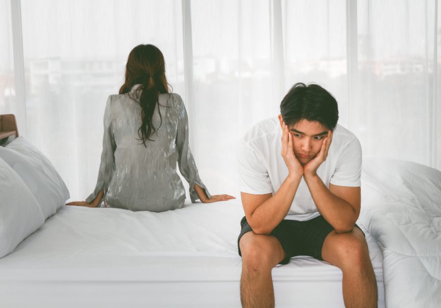 couple sitting on opposite side of bed When To Walk Away From A Sexless Marriage