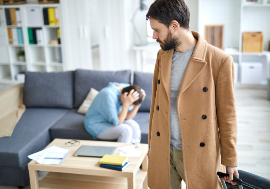 man standing woman sad on sofa Goodbye Letter to Lover