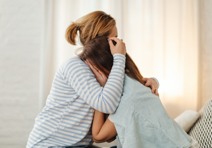 women hugging emotionally How To Deal With Having an Estranged Daughter