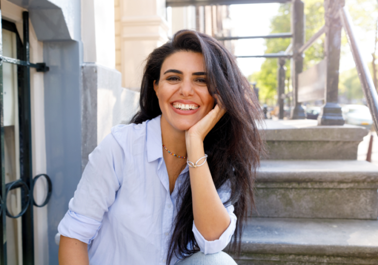 woman sitting on steps high-value woman