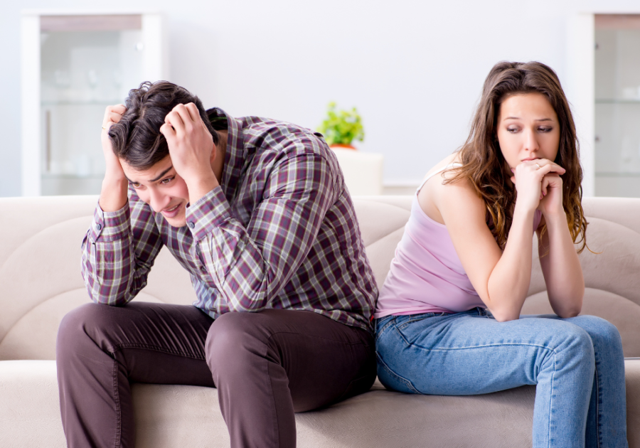 man frustrated sitting by woman how to deal with insecurities in a relationship