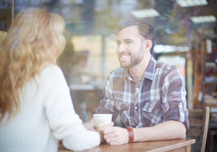 couple sitting at table drinking coffee Dating After Divorce