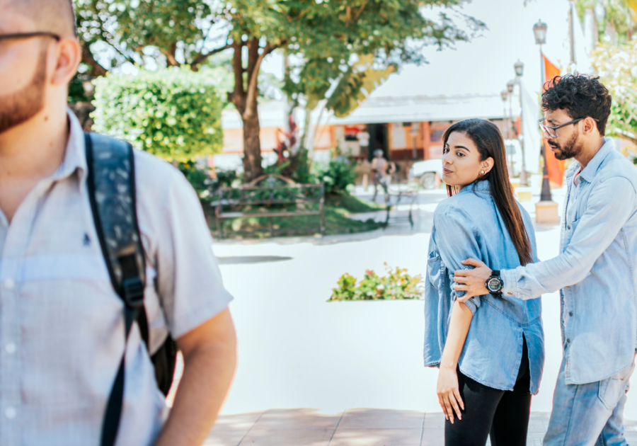 man guiding upset woman Negative Emotions