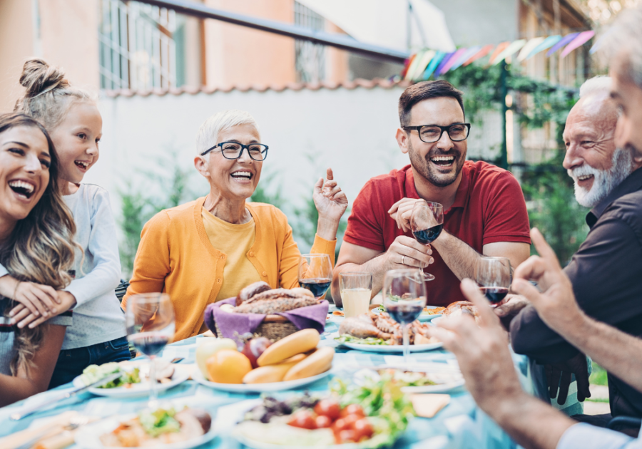 group laughing outdoor meal questions to ask your family