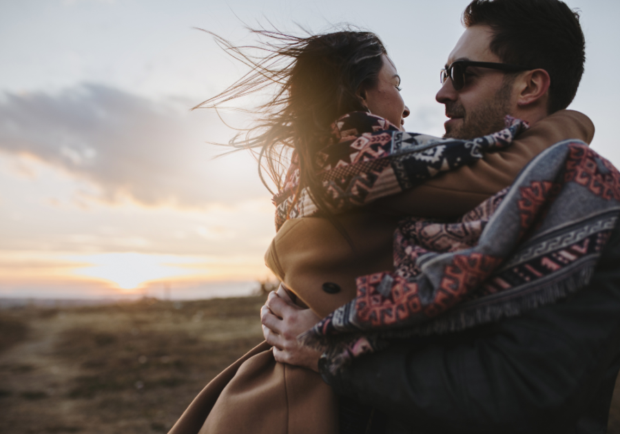 couple hugging outdoors signs of a Passionate Relationship