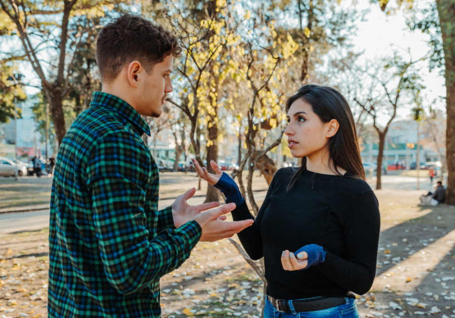 man and woman in park talking should i break up with my girlfriend?