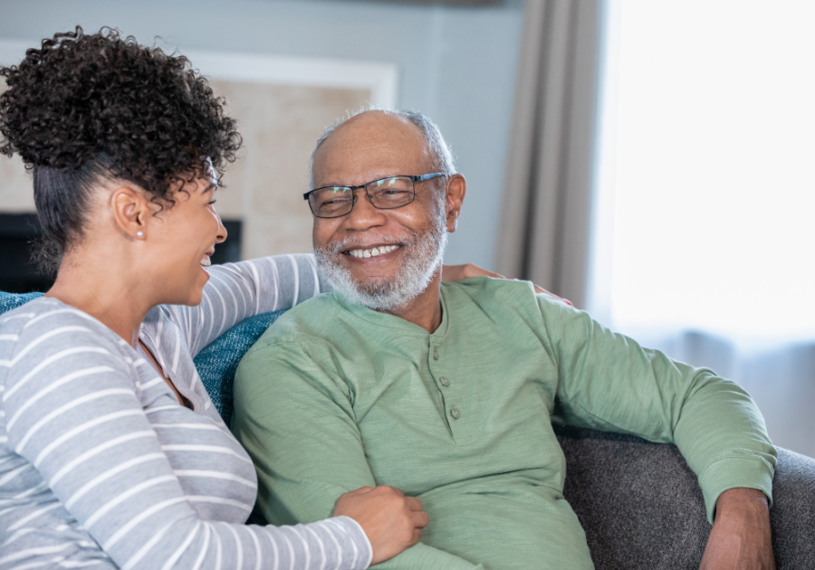 younger woman with arm around older man Questions To Ask Your Dad