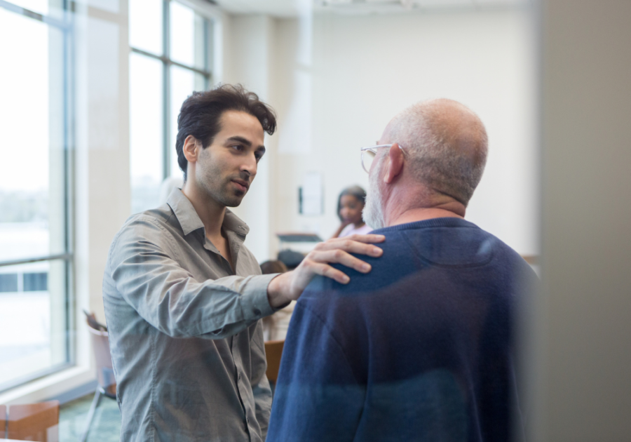 man with hand on shoulder of older man Questions To Ask Your Dad