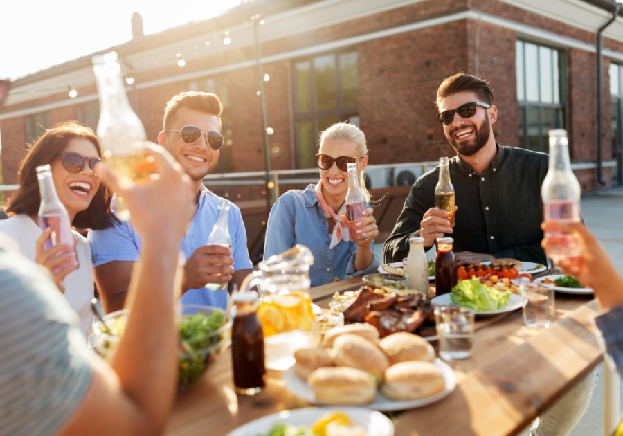 group sitting a table outdoors introvert or extrovert quiz