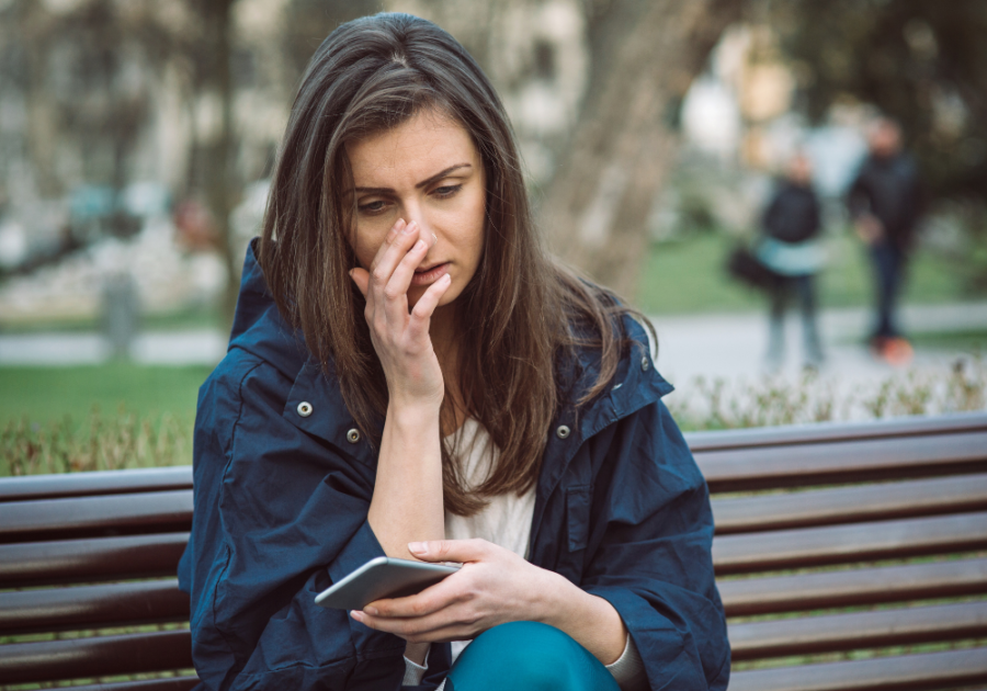 woman sitting on bench sad How Could My Ex Fall in Love with Someone Else So Quickly?