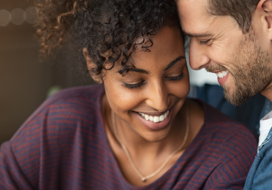 man and woman smiling close together Friends with Benefits rules