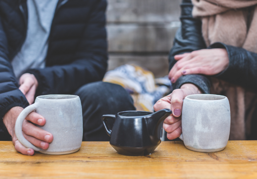 people holding coffee mugs sitting together Become More Emotionally Available