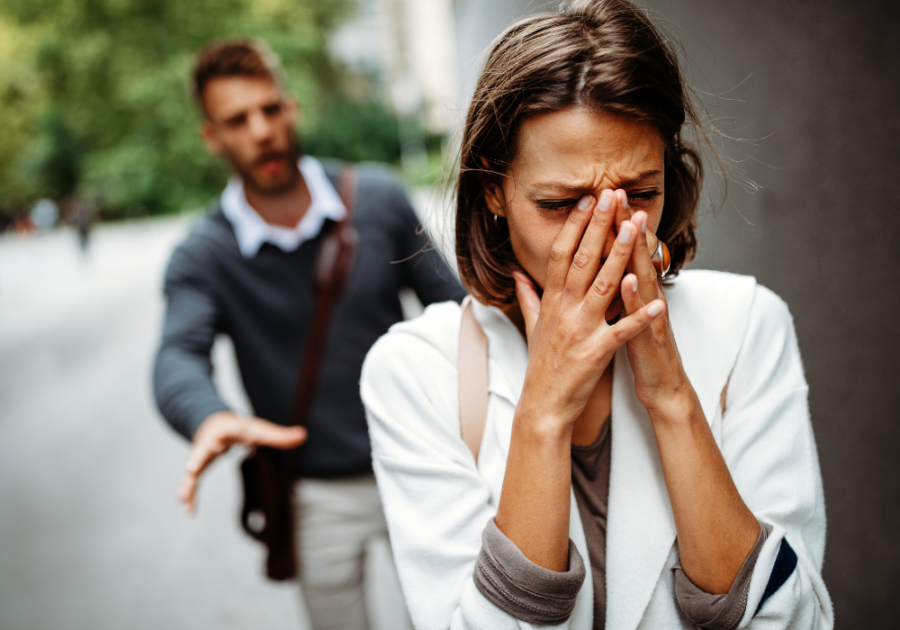 woman crying man is walking behind How Could My Ex Fall in Love with Someone Else So Quickly?