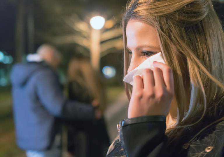 woman crying at event How Could My Ex Fall in Love with Someone Else So Quickly?