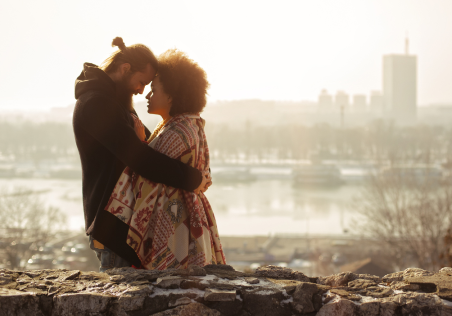 couple standing by river hugging closely Sexual Soul Ties